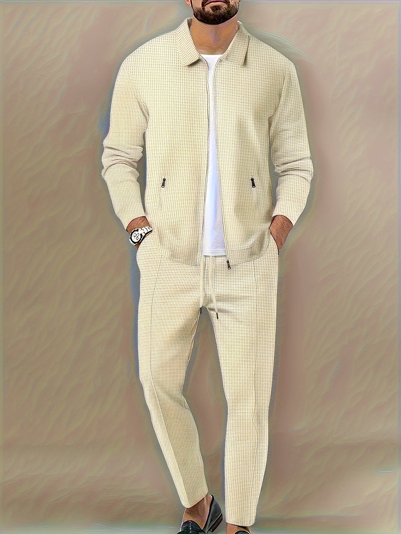 Men's casual waffle knit sweatsuit set with polyester zippered jacket and regular fit pants.