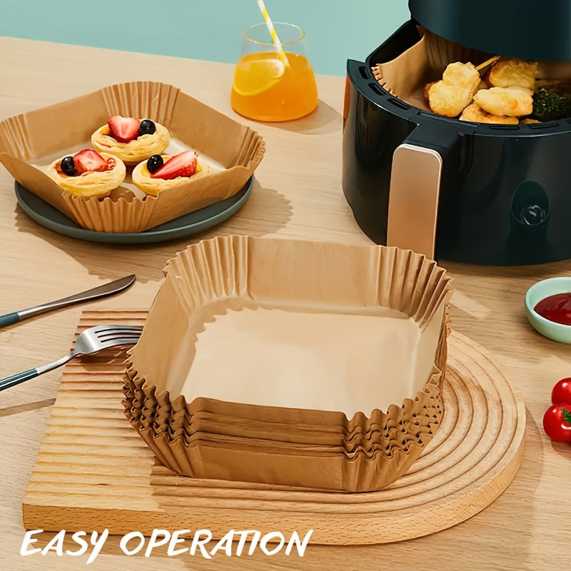 50 large rectangular silicone air fryer liners, designed for easy cleaning and space-saving storage. These non-stick, oven safe liners are ideal for home chefs looking to simplify their baking and cooking experience.