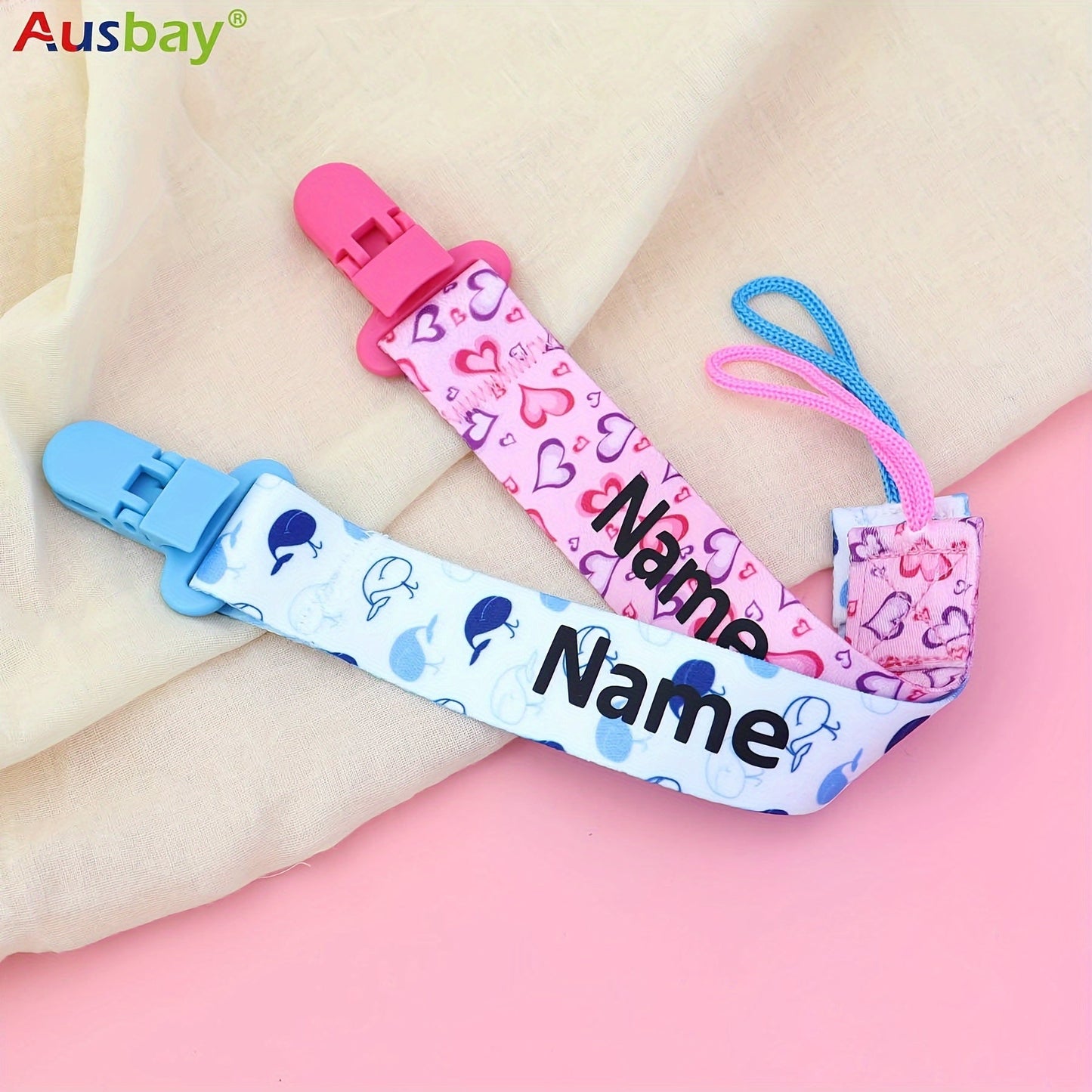 Handcrafted newborn baby birthday and baptism gifts - Personalized pacifier chains in a two-pack with custom fabric designs.