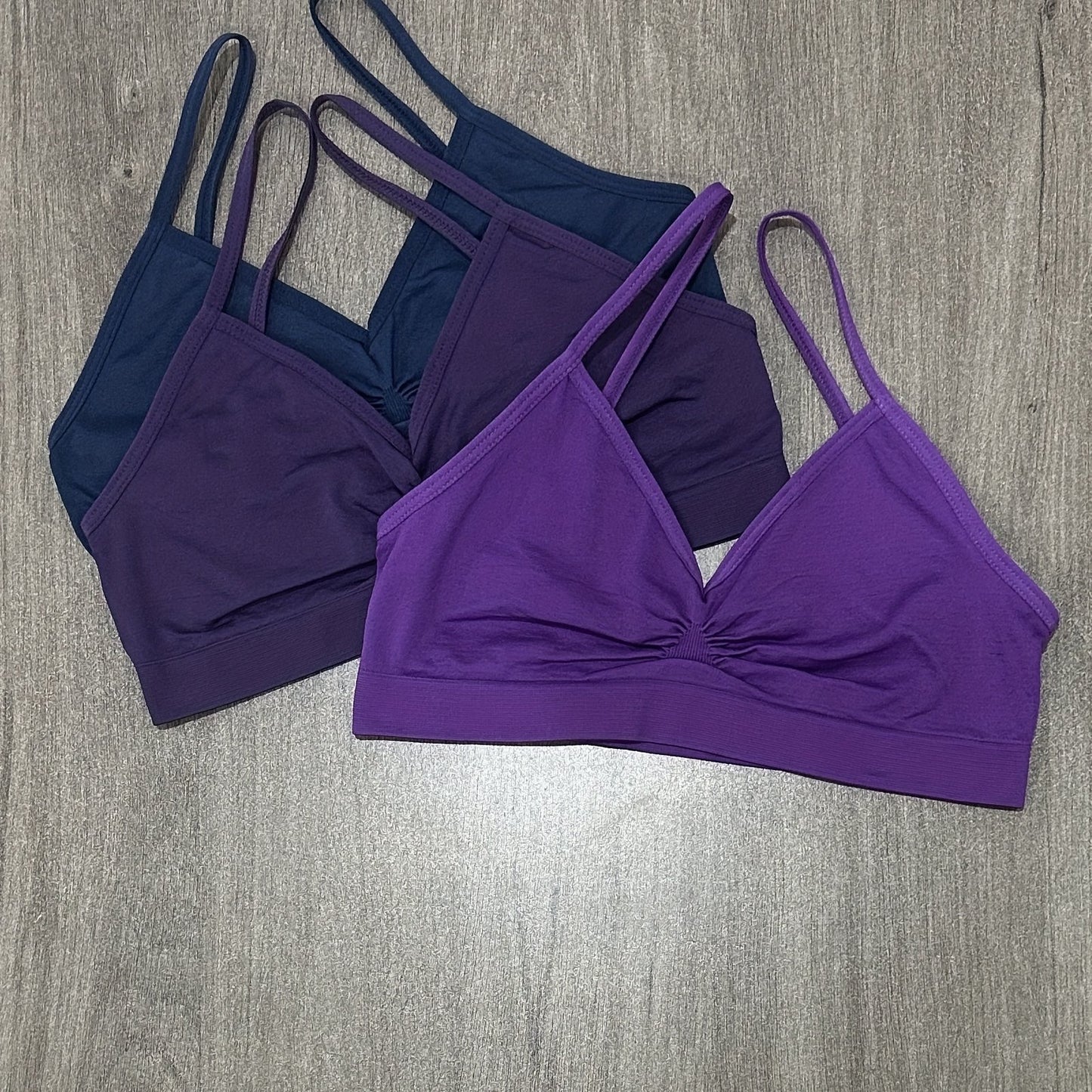 3-pack seamless bralettes for women, youth-friendly, soft stretch fabric, no underwire or padding, solid colors, knitted nylon material.