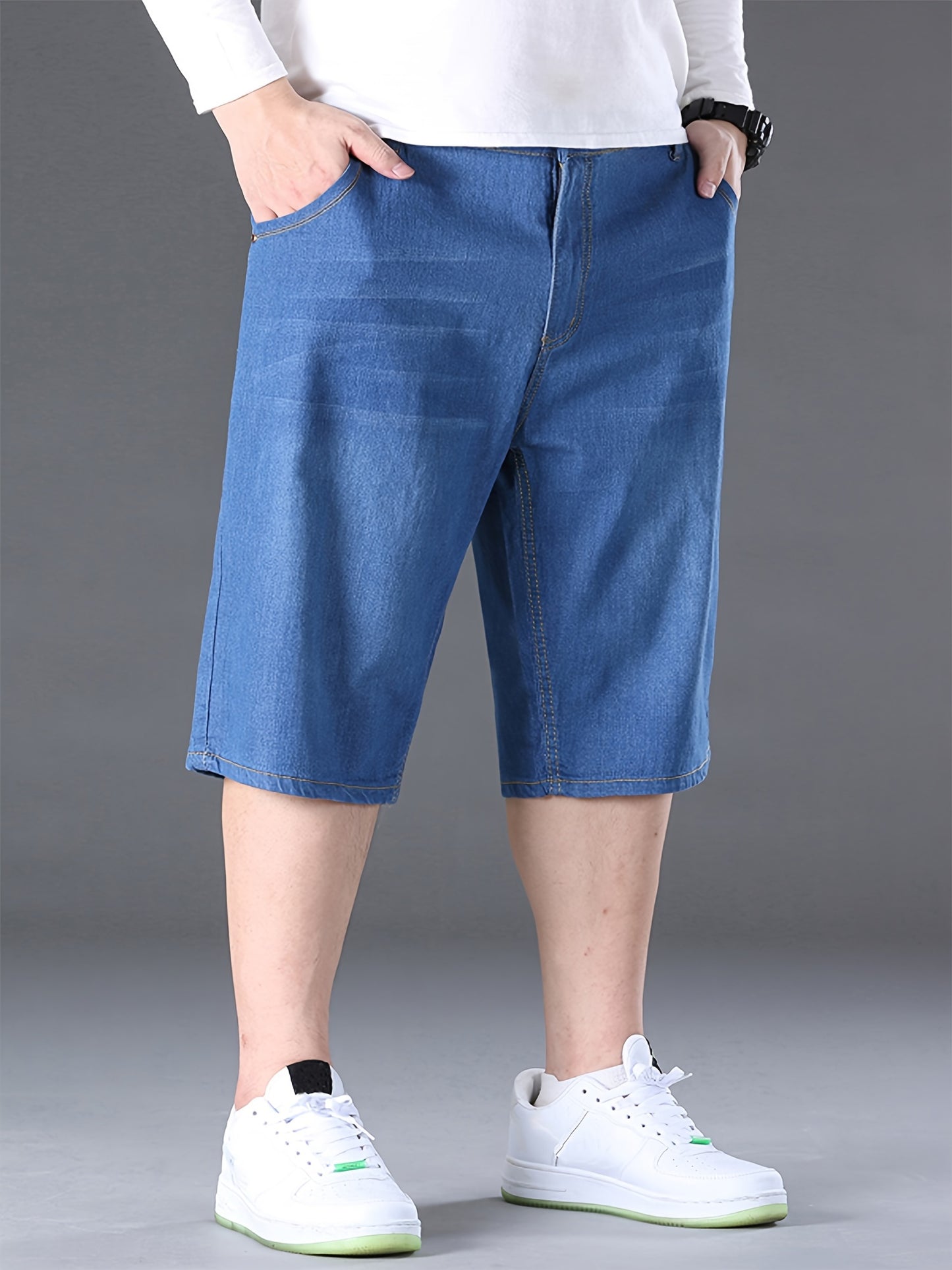 Stylish summer denim shorts for plus-size men in blue.