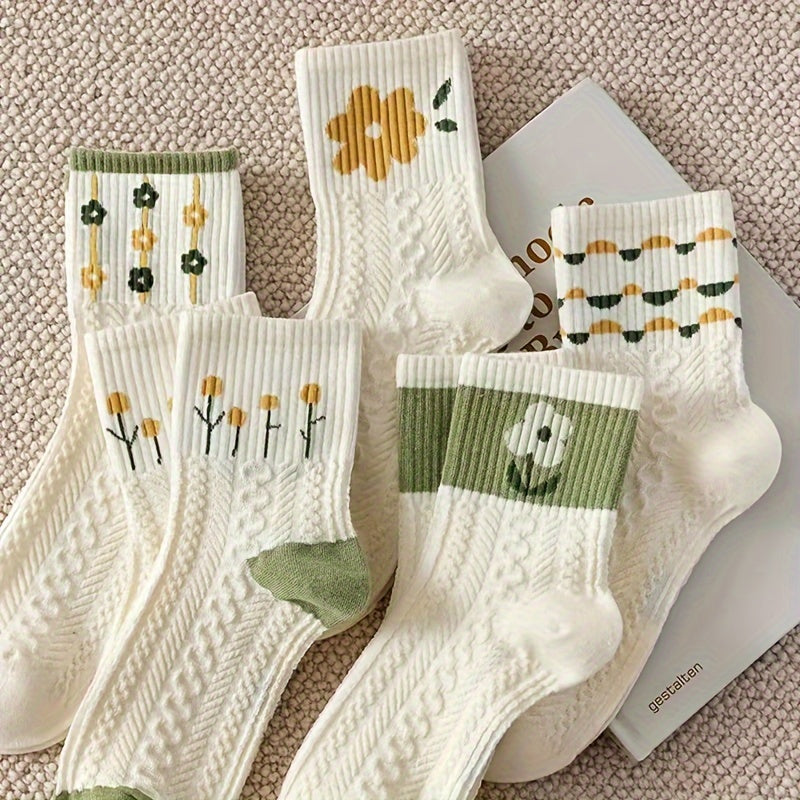 Five pairs of mid-calf socks for women with floral patterns.