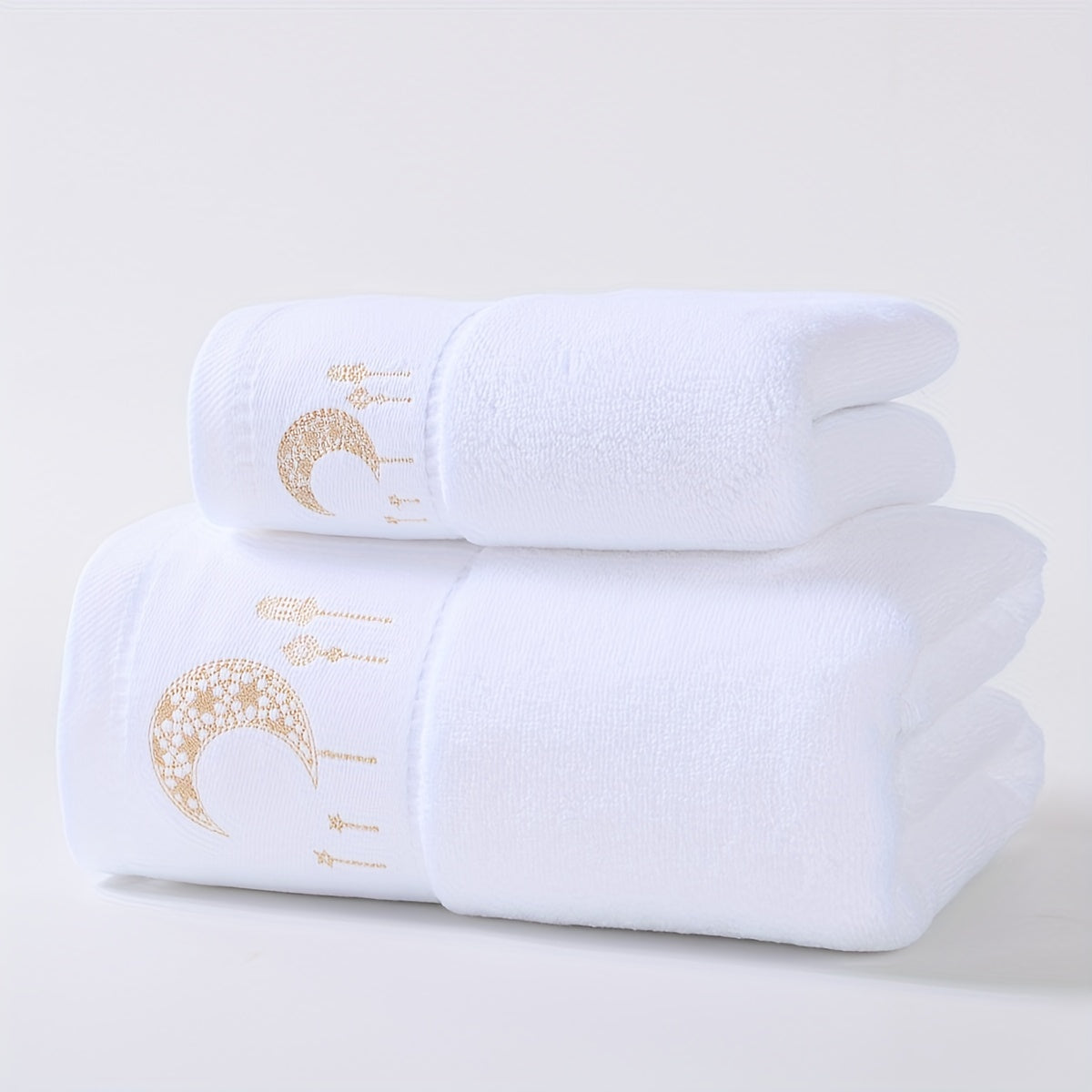 A set of 2 pure cotton velvet towels with star and moon embroidery in sizes 34*75cm and 70*140cm. Perfect for couples as a Valentine's Day gift or for general home use. Includes a washcloth and a beach/bath wrap.