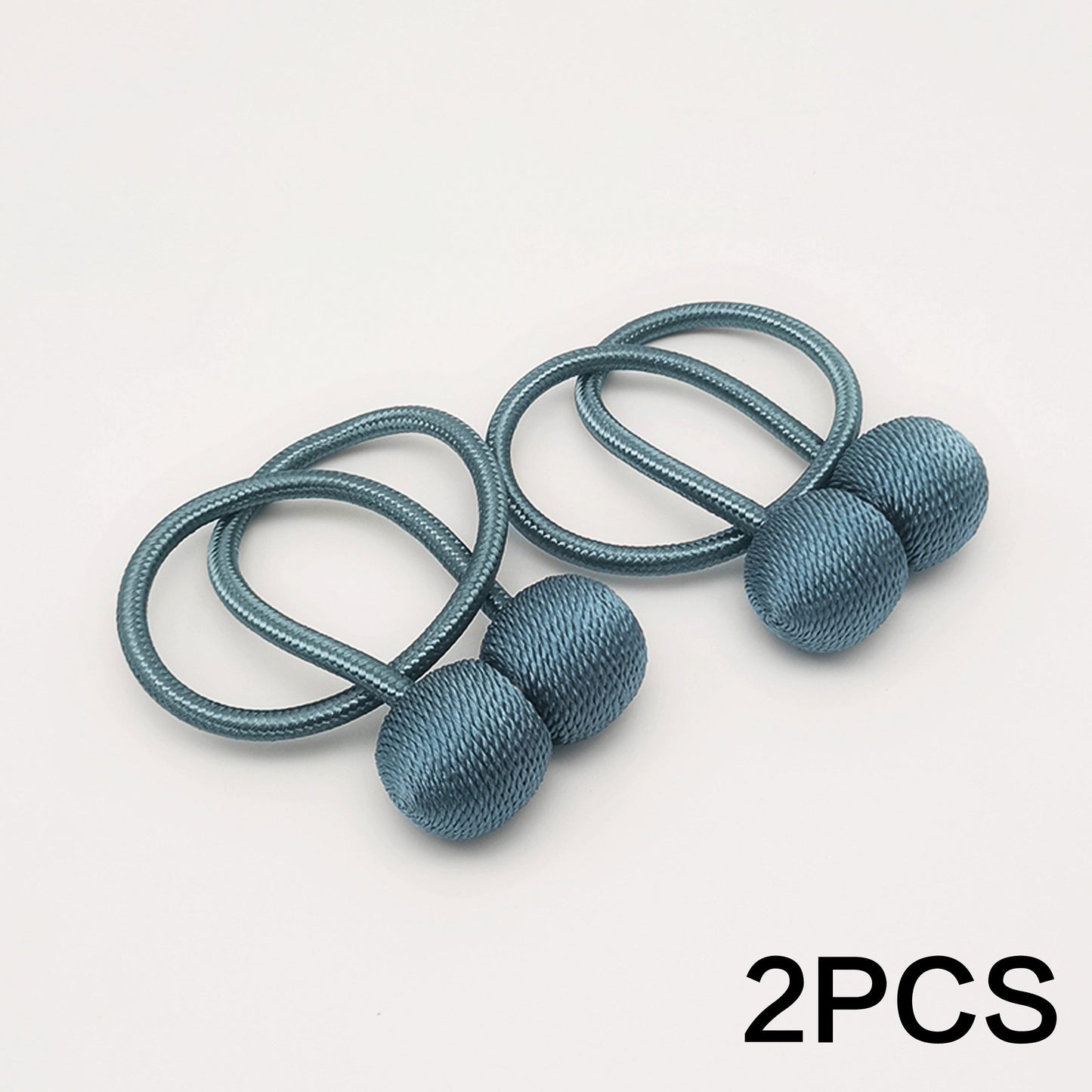 Get your hands on a set of two Classic Style Magnetic Curtain Tiebacks. These tiebacks are designed to be durable and easy to install without any drilling required. Made from polyester twisted rope, they feature a strong magnetic hold to secure your