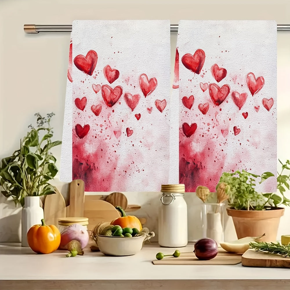 Set of 2 Valentine's Day Kitchen Towels, featuring 'Love At First Swipe' Hearts design. These Ultra Soft and Highly Absorbent Dish Hand Towels are perfect for holiday decor. Machine washable, each towel measures 16x24 inches. Item number: 2KYSYS1217559