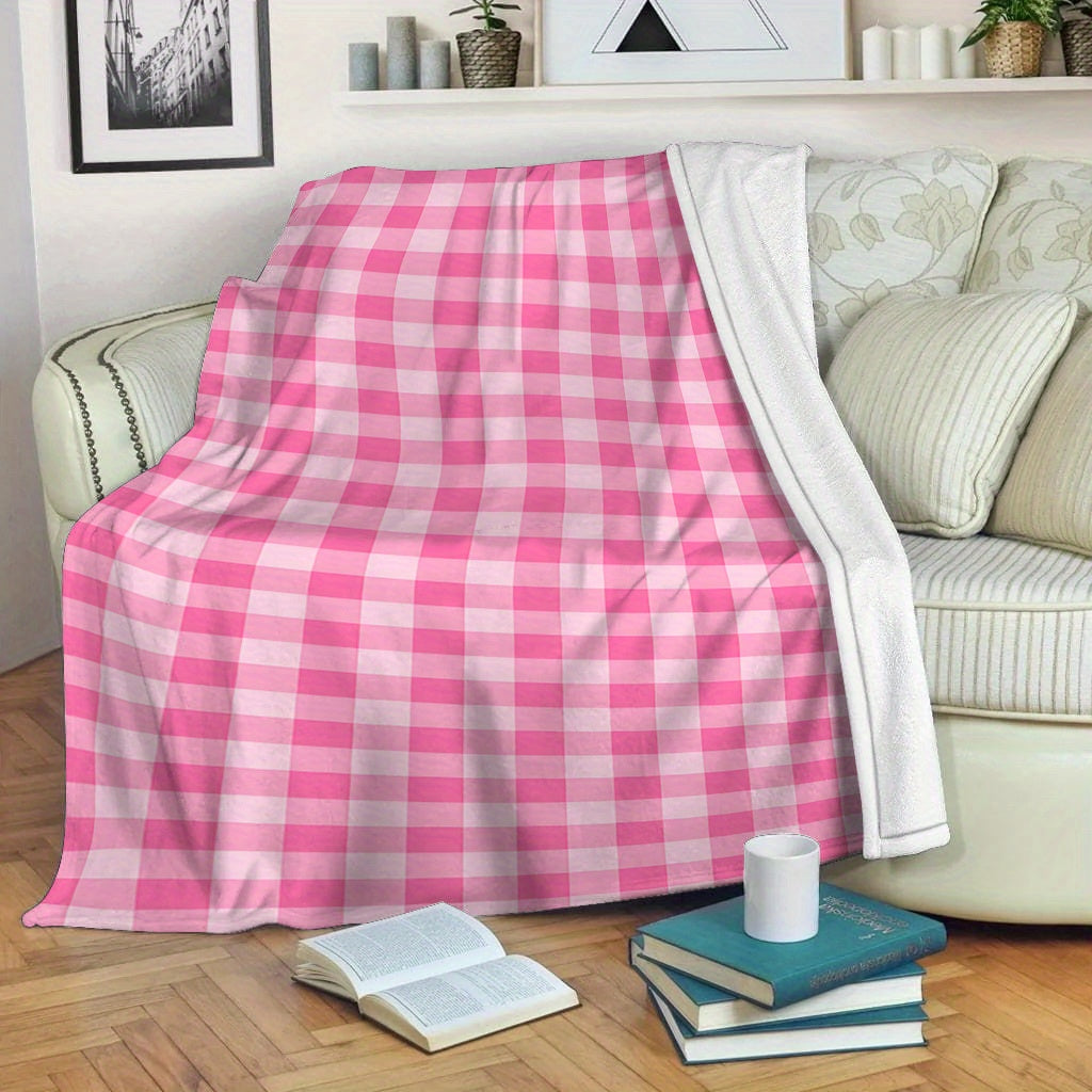 Soft and cozy polyester knit pink gingham flannel throw blanket. Ideal for adding a touch of contemporary style to your bedroom, sofa, or living room decor. Perfect for all-season use and makes an ideal gift for girls, daughters, and sisters. Features a