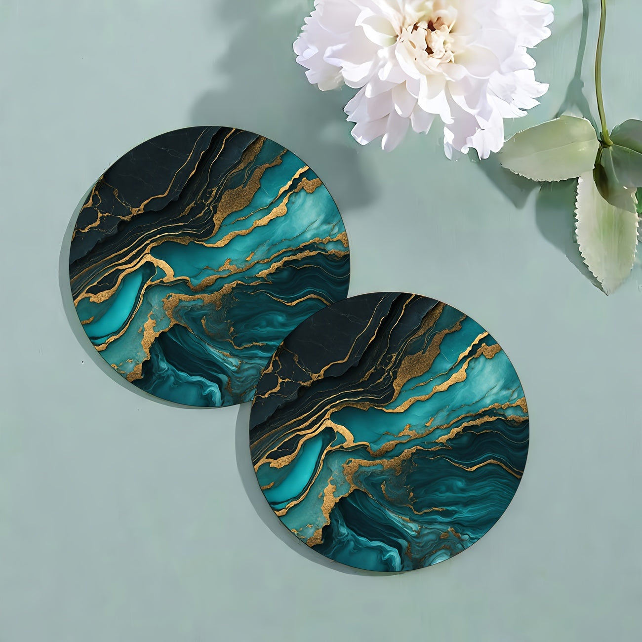 6 golden marbled coasters with absorbent rubber and non-slip backing, perfect for home decor or as a housewarming gift, each 10.16 cm in diameter.