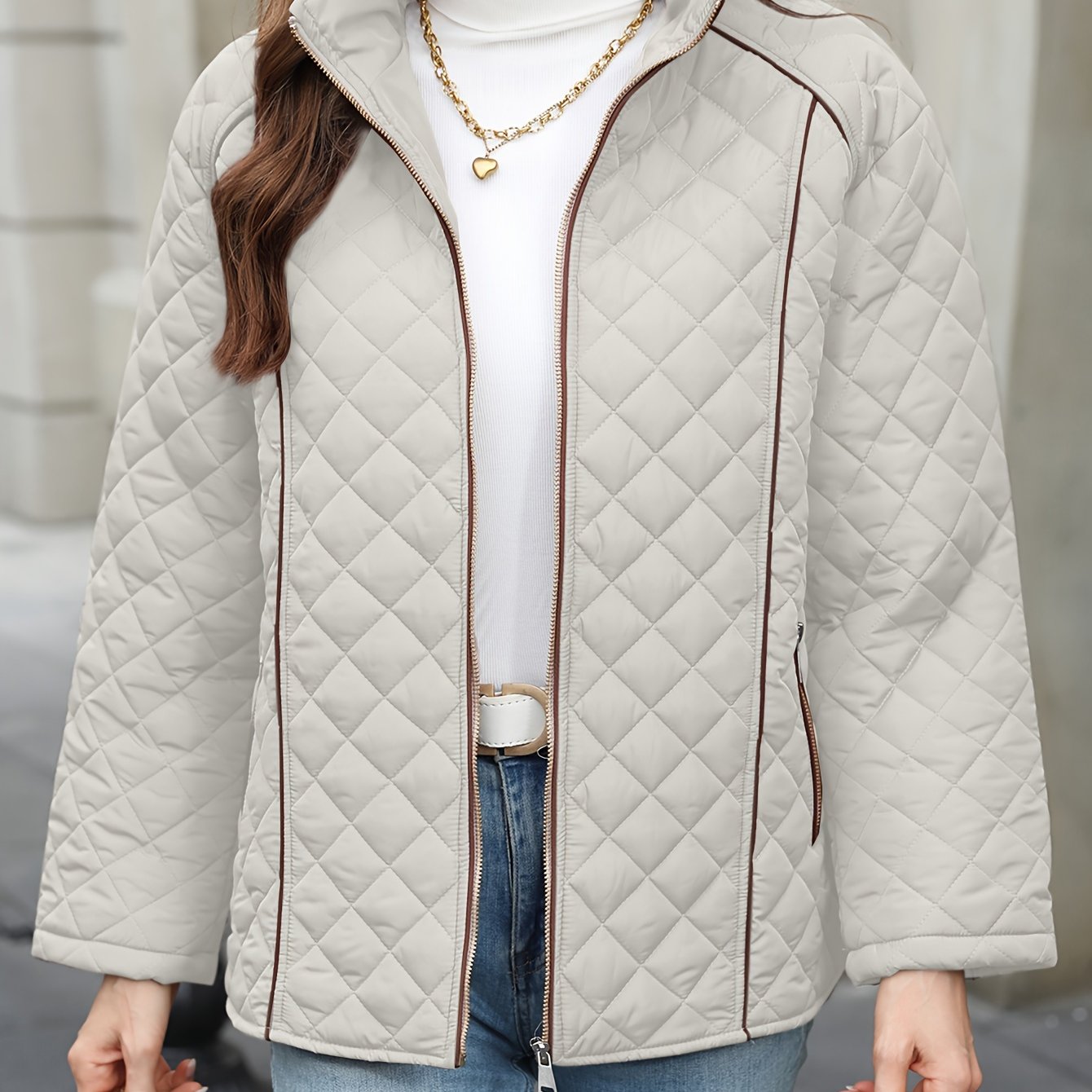 Women's plus size casual quilted outerwear with stand collar, zipper, and long sleeves. Made of 100% non-stretch solid woven polyester for fall/winter.