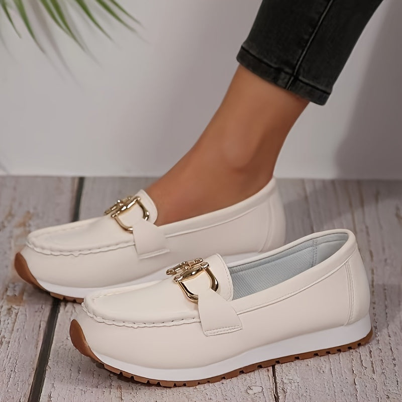 Solid color loafers for women with metallic buckle, soft sole, and closed toe for casual wear.