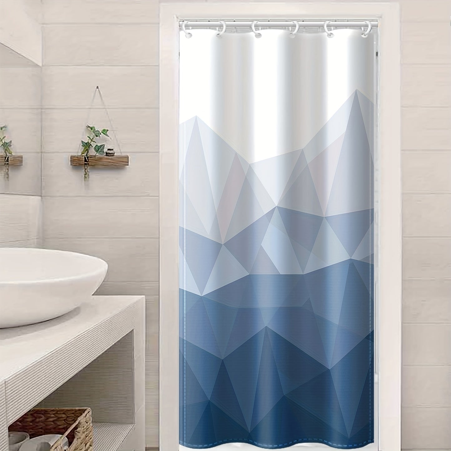 Blue gradient geometric pattern shower curtain with 12 hooks, made of waterproof polyester, suitable for home or hotel bathrooms. Machine washable and can also be used as a window curtain for bathroom décor.