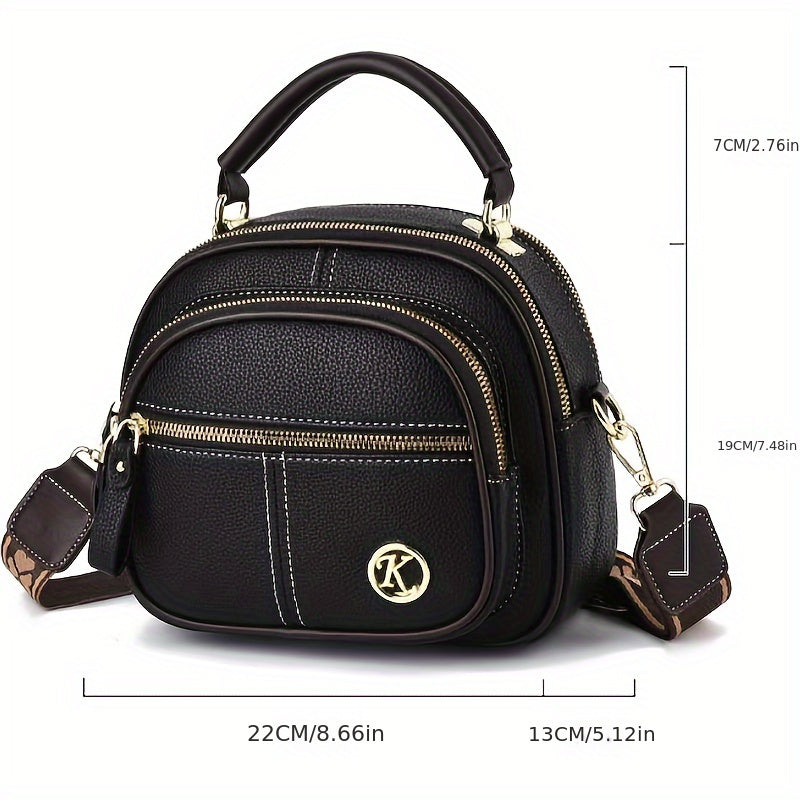 Versatile small handbag with multiple pockets and adjustable strap for women's fashion.