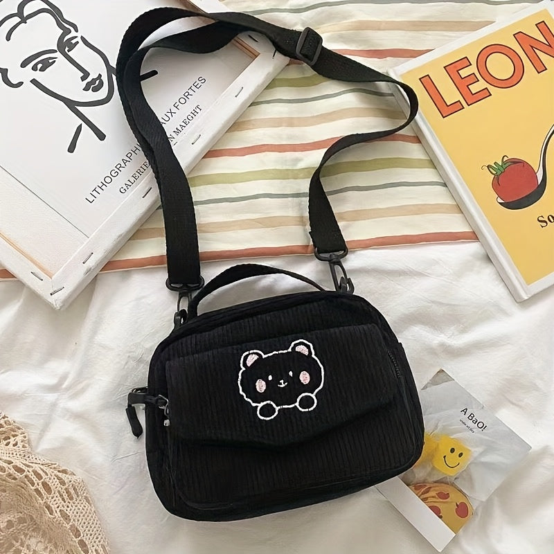 Adorable cartoon animal print crossbody bag with adjustable strap and zipper closure. Lightweight and hand washable, perfect for trendy high school girls.