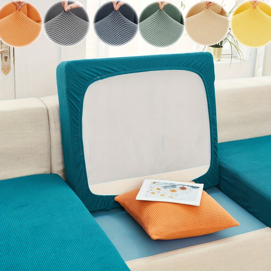 Durable sofa cover protects furniture from spills and stains.