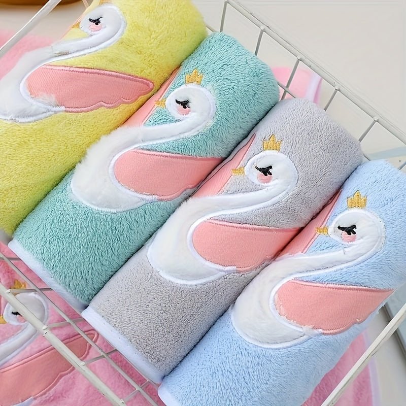 A 75*35cm Cartoon Swan Kid's Bath Towel with premium softness, absorbency, and quick-drying capability, ideal for use in the bathroom or at home.