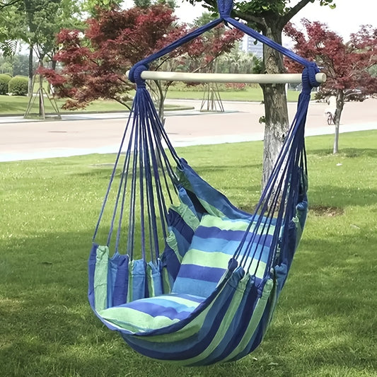 Blue & Green Striped Hammock Chair with Wooden Rod for Indoor/Outdoor Relaxation.