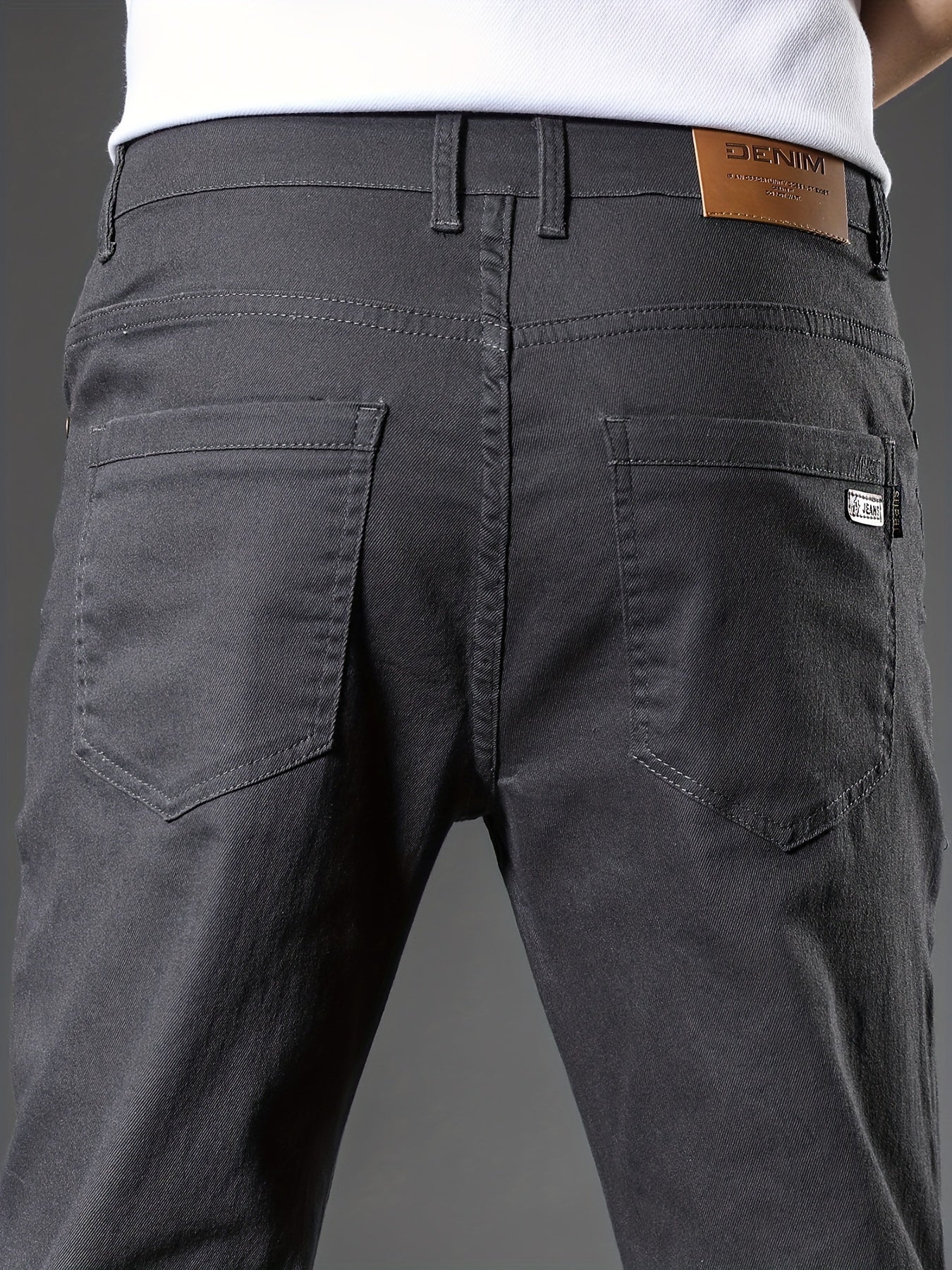 Men's Slim-Fit Stretch Denim Jeans in Black, Lightweight & Comfortable for Spring/Fall, with Classic Design and Slant Pockets.