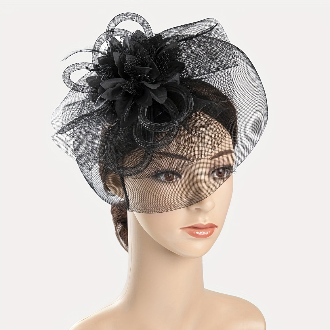 One piece of women's hair accessory featuring a mesh flower, faux feather detailing, and veil perfect for birthday parties, the Jockey Club, weddings, derby hats, and church events.