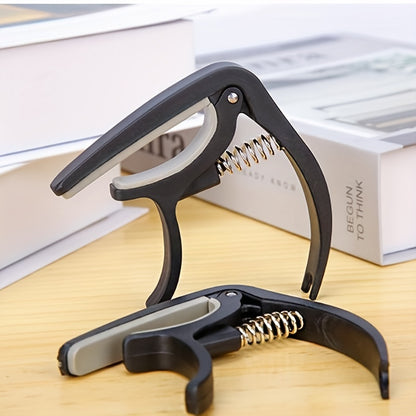 High-quality ABS guitar capo for acoustic, electric guitars and more - durable and easy to clip on.