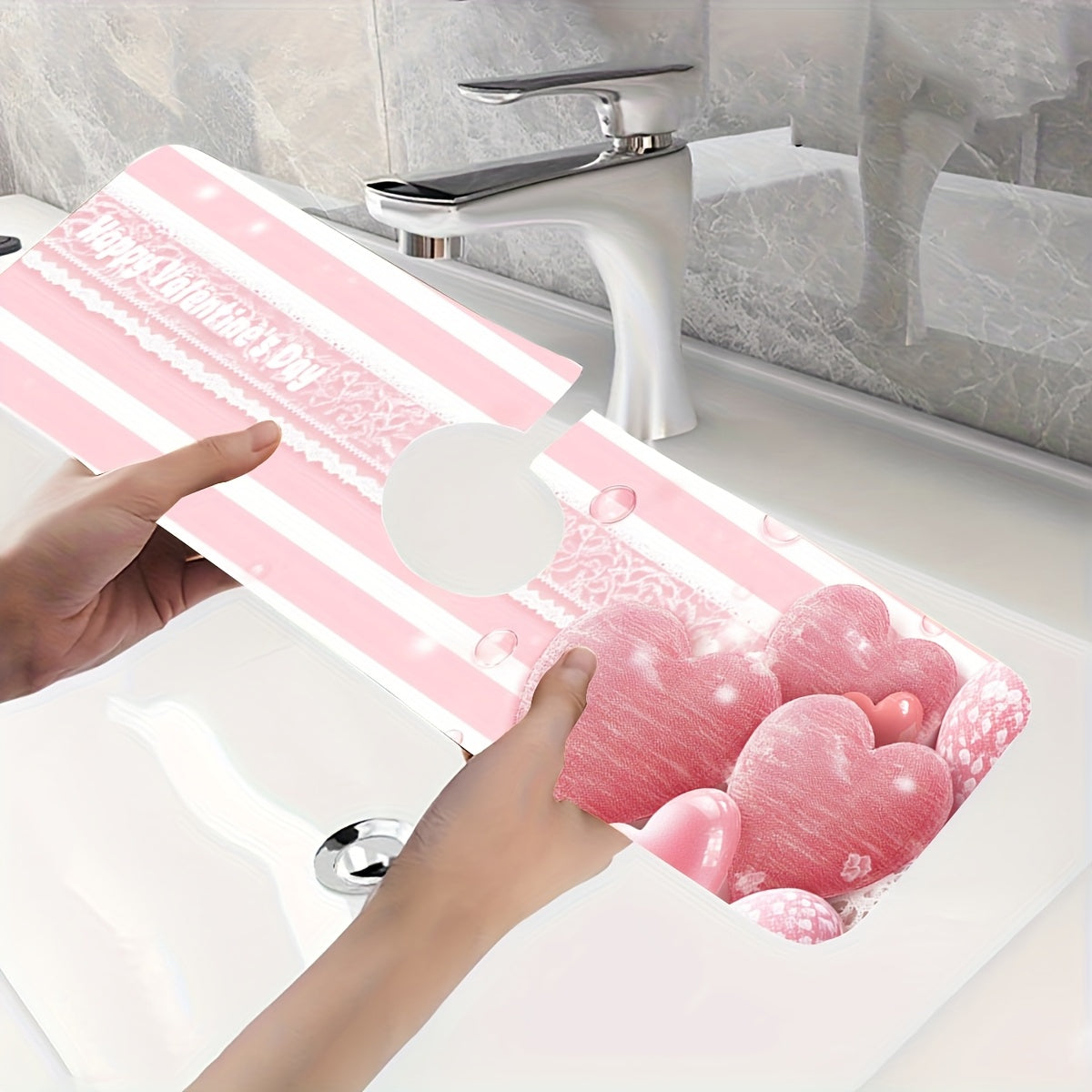 Pink Striped Love Faucet Mat - Perfect for Valentine's Day! Made from durable polyester, this moisture-proof and absorbent drain pad is ideal for use in the kitchen or bathroom. Features a diatom mud suction cup design for extra grip.