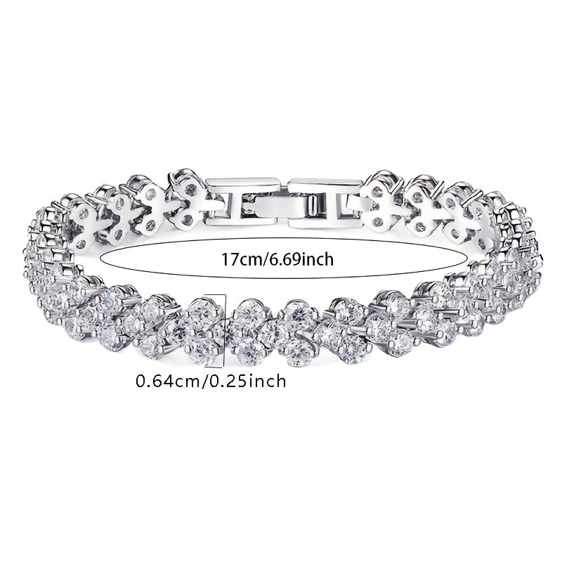 This elegant tennis bracelet is made of high-quality 925 sterling silver and features synthetic Moissanite stones. With its classic luxury design, this unisex bracelet is the perfect accessory for daily wear or gift-giving. It is also suitable for all