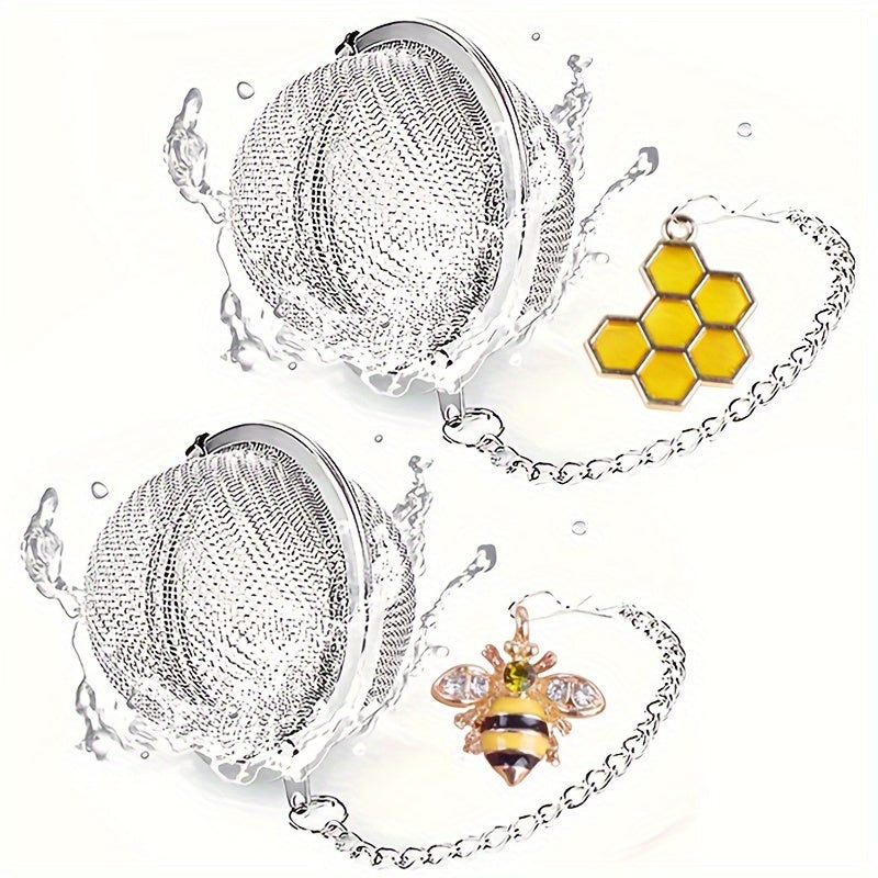 Gift your loved ones with a set of two stainless steel tea strainers adorned with charming honeybee and beehive designs. These durable infusers come with hanging chains and are perfect for brewing loose leaf tea. Ideal for Christmas, Thanksgiving