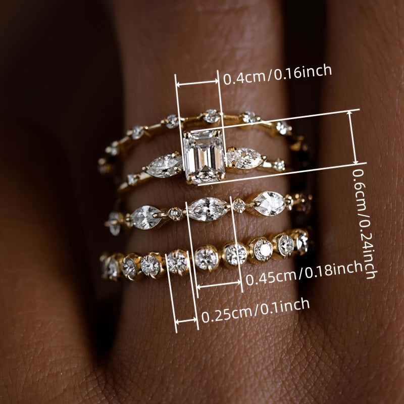 Set of four stunning gold cubic zirconia stacking rings designed for women, offering an elegant and luxurious style. Perfect for engagements, anniversaries, and as a daily or party wear accessory.