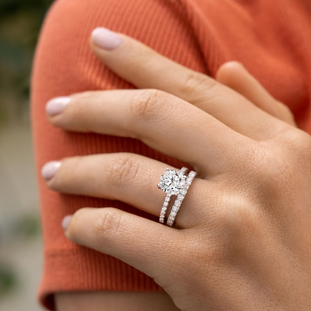 Description: 

This elegant and luxurious stacking ring features a 5g Silver S925 band with a stunning 2ct/3ct Moissanite round drill. It is the perfect choice for women looking to showcase their unique personality. This ring is ideal for proposals