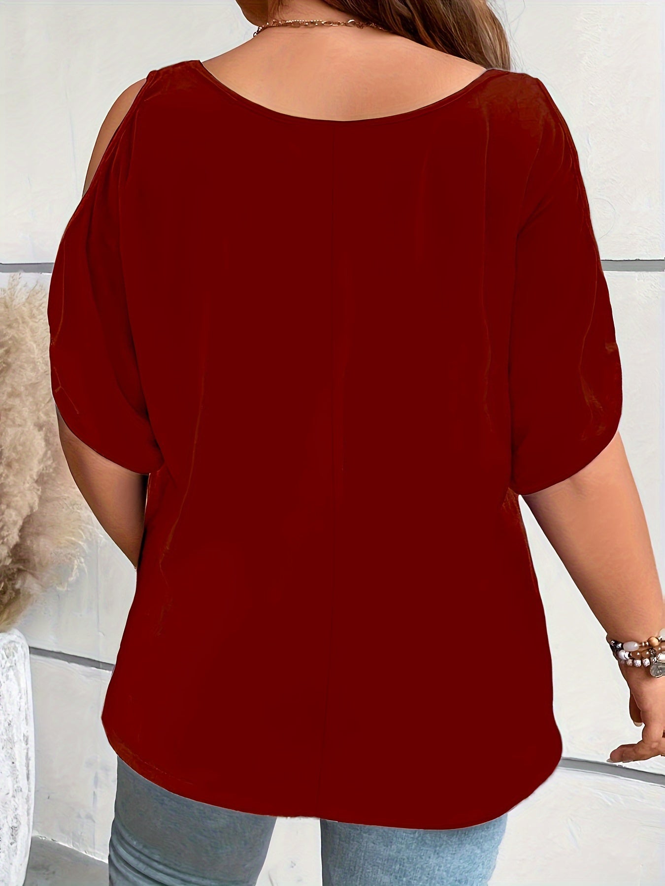 Solid cold shoulder tee for plus size women, casual crew neck with short sleeves.