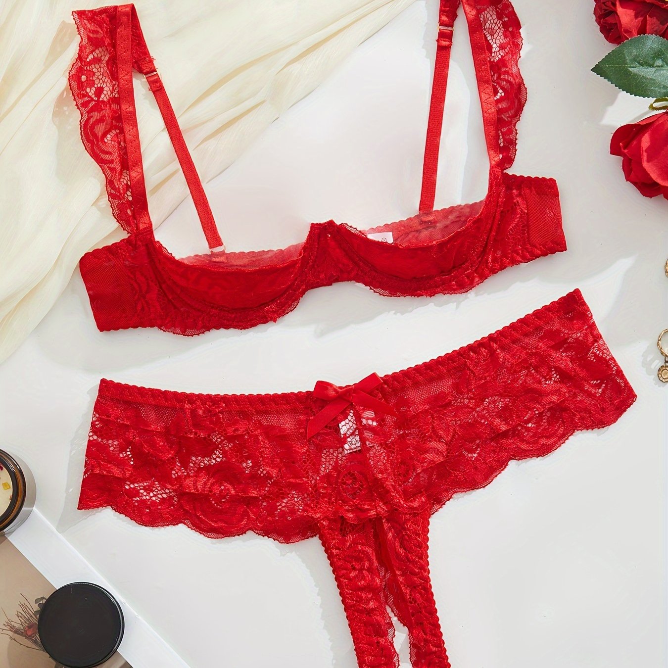 Women's lace lingerie set with open crotch briefs.