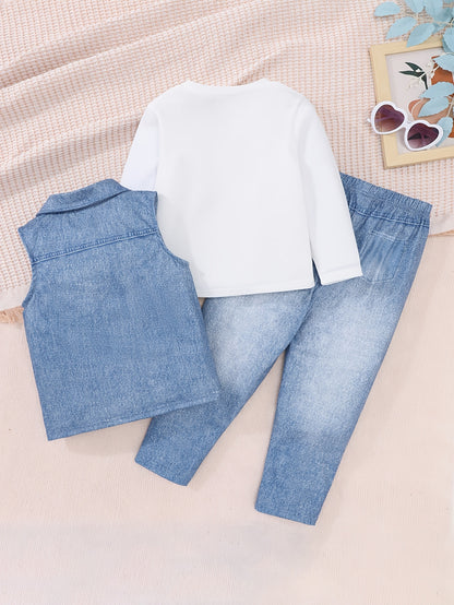 Chic street style girls' outfit: "Mama's Girl" printed denim vest & white long sleeve tee with floral jeans - casual knit fabric for spring/fall, perfect for outdoor wear.