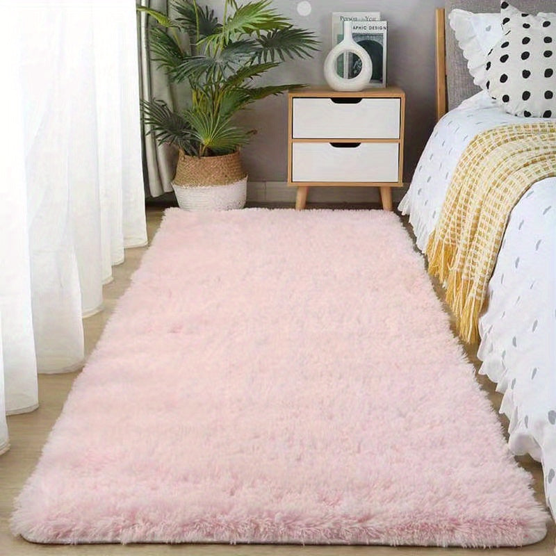 Soft, fluffy shag area rug perfect for living room or bedroom decor. This non-slip machine washable carpet adds luxury and coziness to any space.