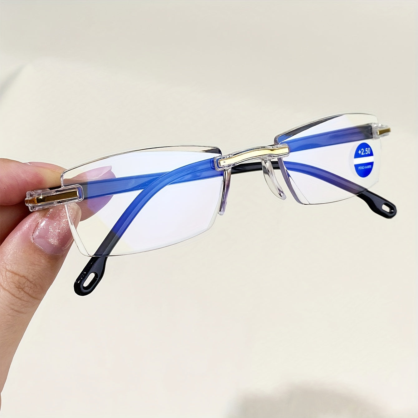 4 Rimless Blue Light Blocking Reading Glasses for Men and Women, designed to reduce eyestrain.