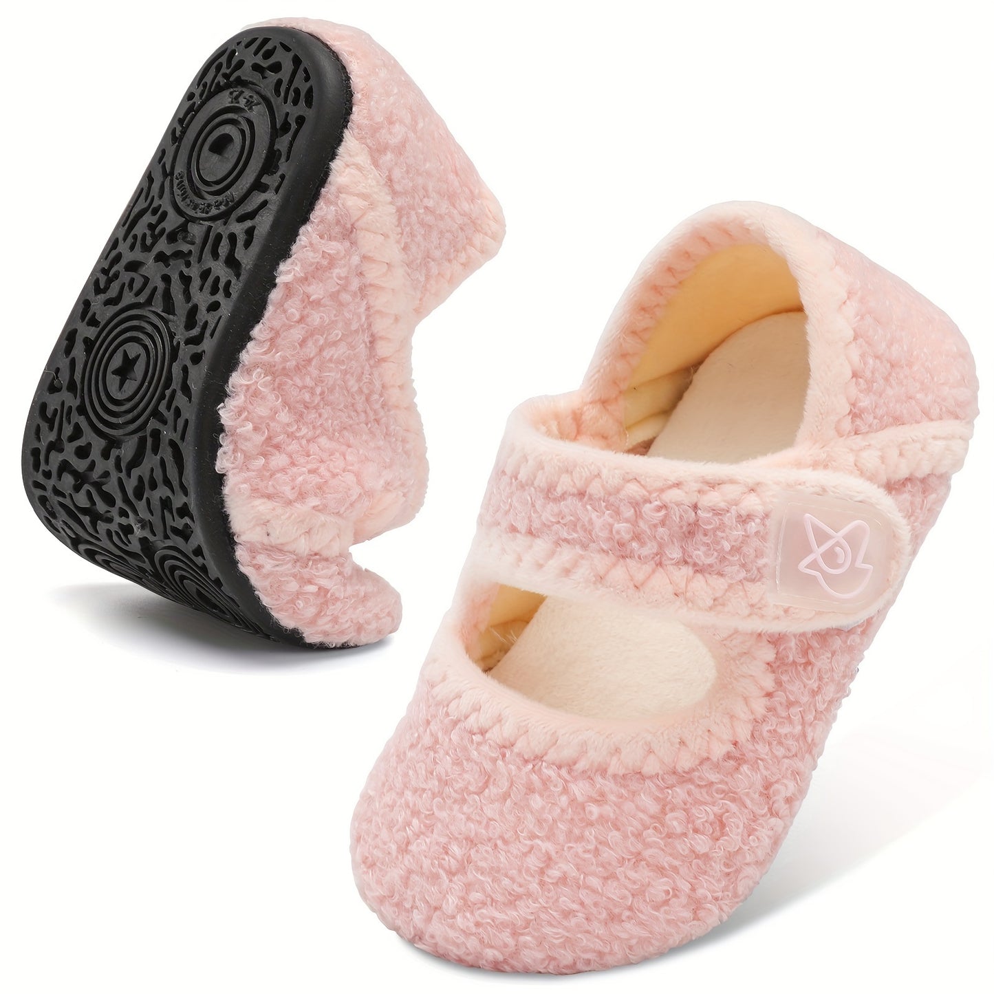 Cozy cartoon house shoes for children, warm and nonslip for indoor winter walking.