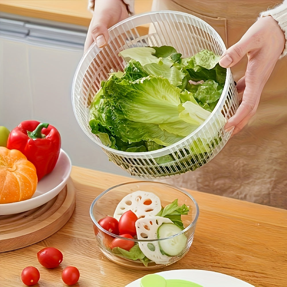 Multi-functional kitchen spinner and dryer with vegetable and fruit colander. Effortless salad prep tool made of durable PP material. White base with green accents. Ideal for healthy meal