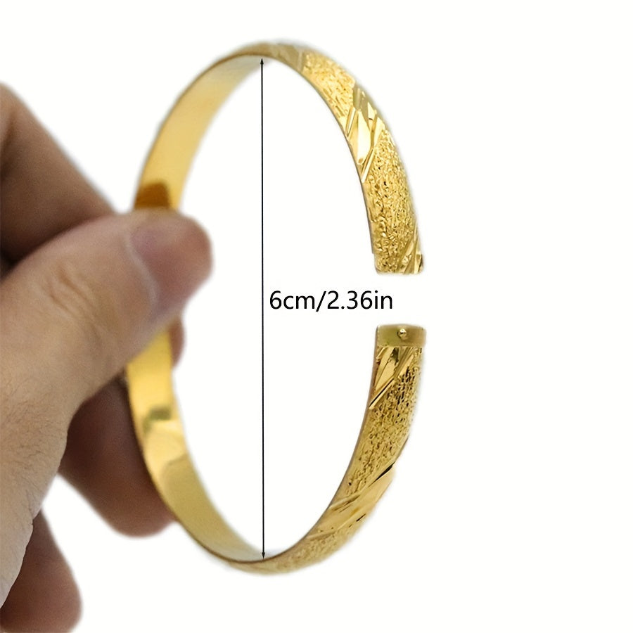 6 pieces of Bohemian Luxurious 24K Golden Plated Copper Bangle Set featuring 8mm African Ethiopian Hand Bracelets. This unisex Wedding Gift Jewelry is perfect for women and can be worn as a stunning accessory for parties and Lunar New Year celebrations.