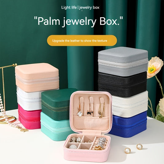 One stylish and portable jewelry box for earrings, rings, and necklaces.