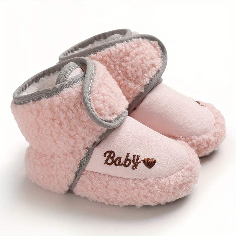 Cozy boots for baby boys and girls, featuring hook and loop fasteners for indoor and outdoor winter walks.