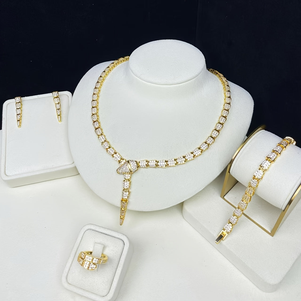 Stunning 18K Gold Plated Copper Jewelry Set featuring AAA Zirconia Stones, featuring a Seductive Snake Design Necklace and Ring. Suitable for both Everyday Wear and Special Occasions, an Ideal Gift for Women, especially during Ramadan.