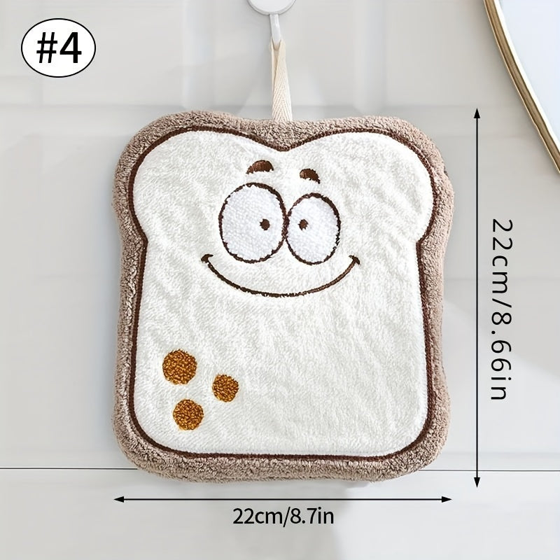 Cartoon food shaped hand towel made of soft coral fleece, quick-dry and absorbent for bathroom or kitchen use. Features designs of cheese, bread, and cookies, can be used as hanging wipe cloth. No electricity required.