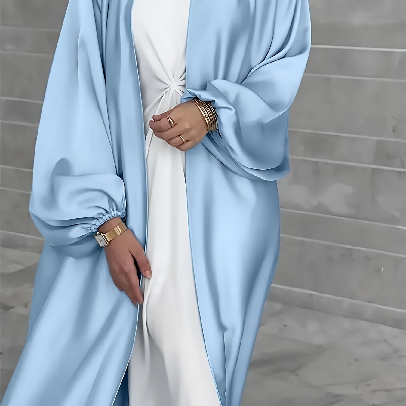 Long, elegant dress with puffed sleeves, slit hem, belt, and regular fit suitable for all seasons. Made of solid color, non-stretch polyester.