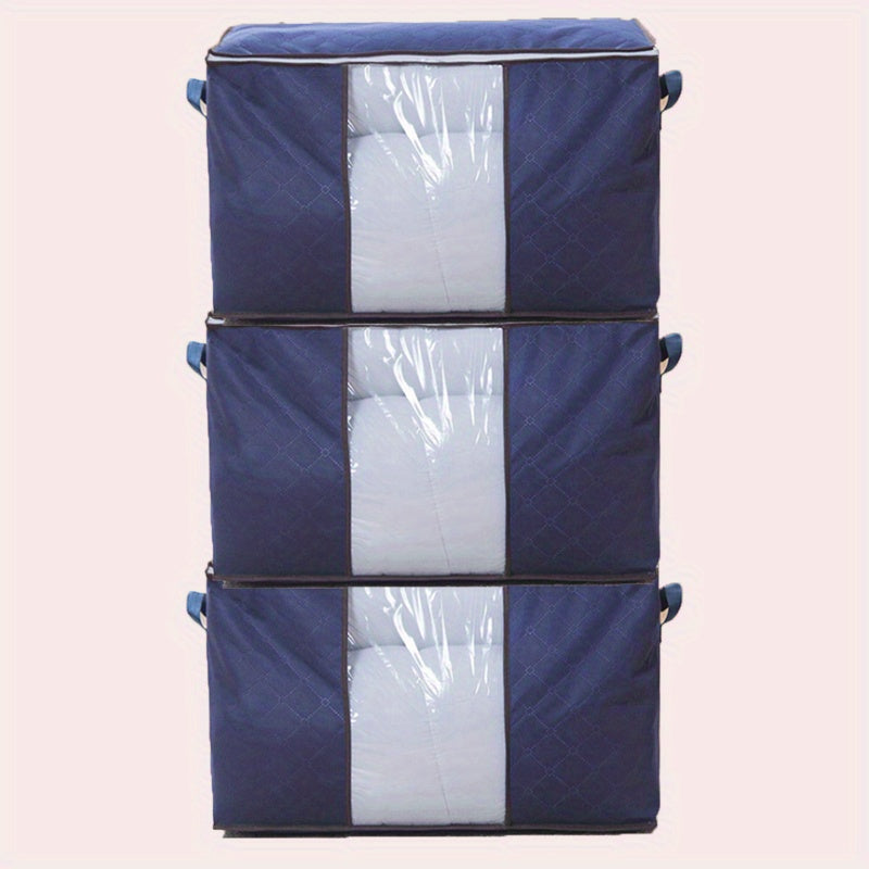 3 pack of 90L large storage bags, with reinforced handles, for clothing, blankets, toys, and bedding in grey.