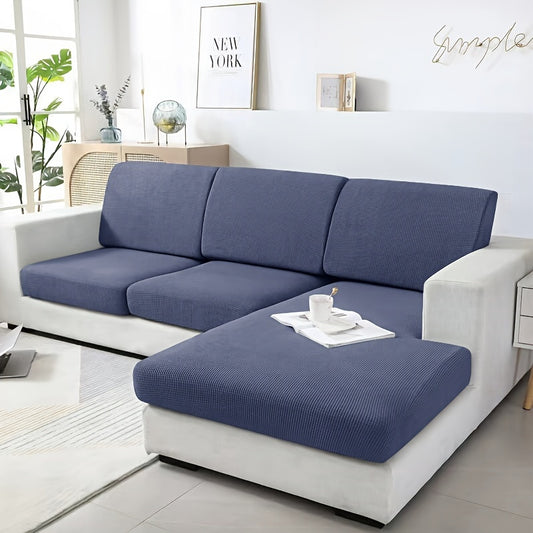 Modern Stretch Sofa Cover made of polyester and spandex blend. Machine washable with elastic band closure. Integrated design fits most sectional sofas in the living room.