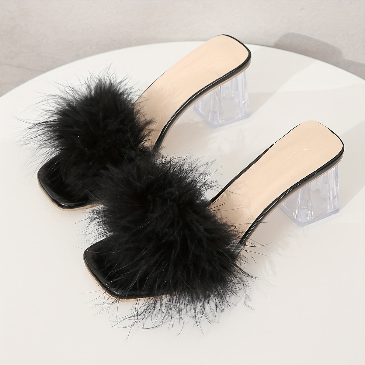 Chunky heel sandals with faux fur decor and square toe design for summer dressy looks.