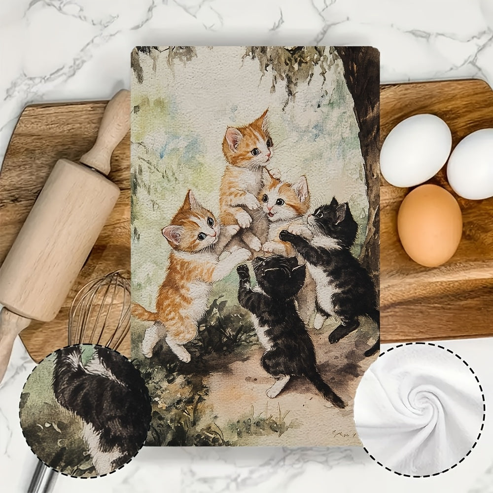 Two ultra plush kitchen towels featuring a playful kittens design. These highly absorbent towels are machine washable and measure 40.64x60.96 cm. Perfect for adding a touch of holiday charm to your kitchen decor and suitable for everyday use as dish