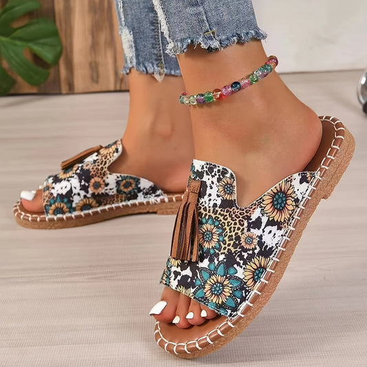 Bohemian canvas sandals with tassel and ethnic pattern, comfy slip-on slides for summer.