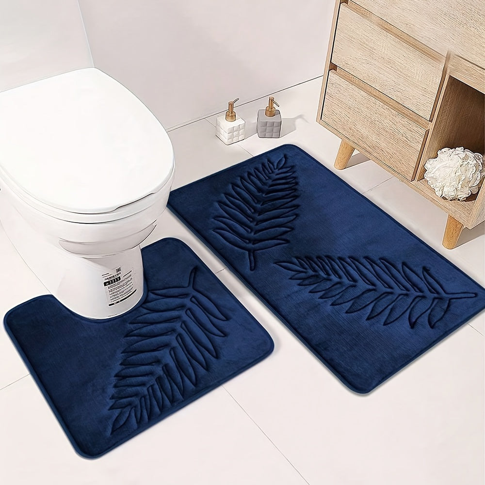 2-piece set of plush memory foam bathroom mats with a fern leaf design. These mats are non-slip, absorbent, and machine washable, making them perfect for adding a touch of style to your home decor.