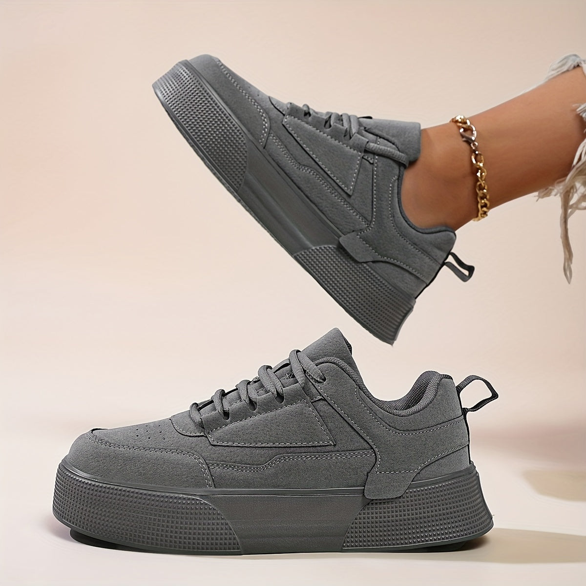 Classic lace-up low top skateboard sneakers for women, with solid color block design and height increase feature. Made with PU upper, fabric inner, and EVA sole for comfort in all seasons.