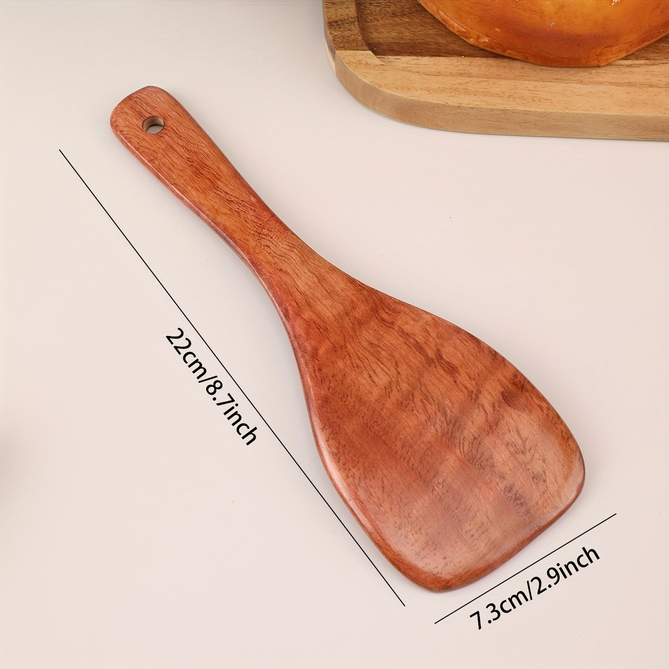 Eco-friendly wooden rice paddle and serving spoon for easy, healthy cooking.