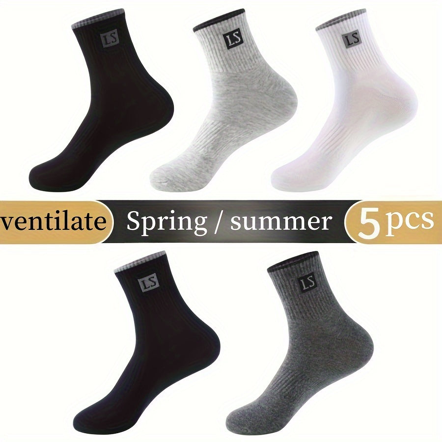 5 pairs of men's trendy solid crew socks, breathable and comfy for outdoor and all-season wear.