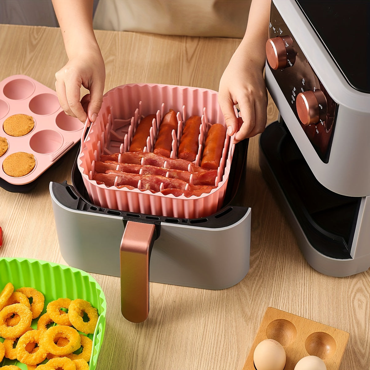 Premium Square Air Fryer Silicone Set includes a bacon & hot dog rack, 9-cavity cake mold, and air fryer pan. This BPA-free and dishwasher safe set is compatible with 7QT+ air fryers.